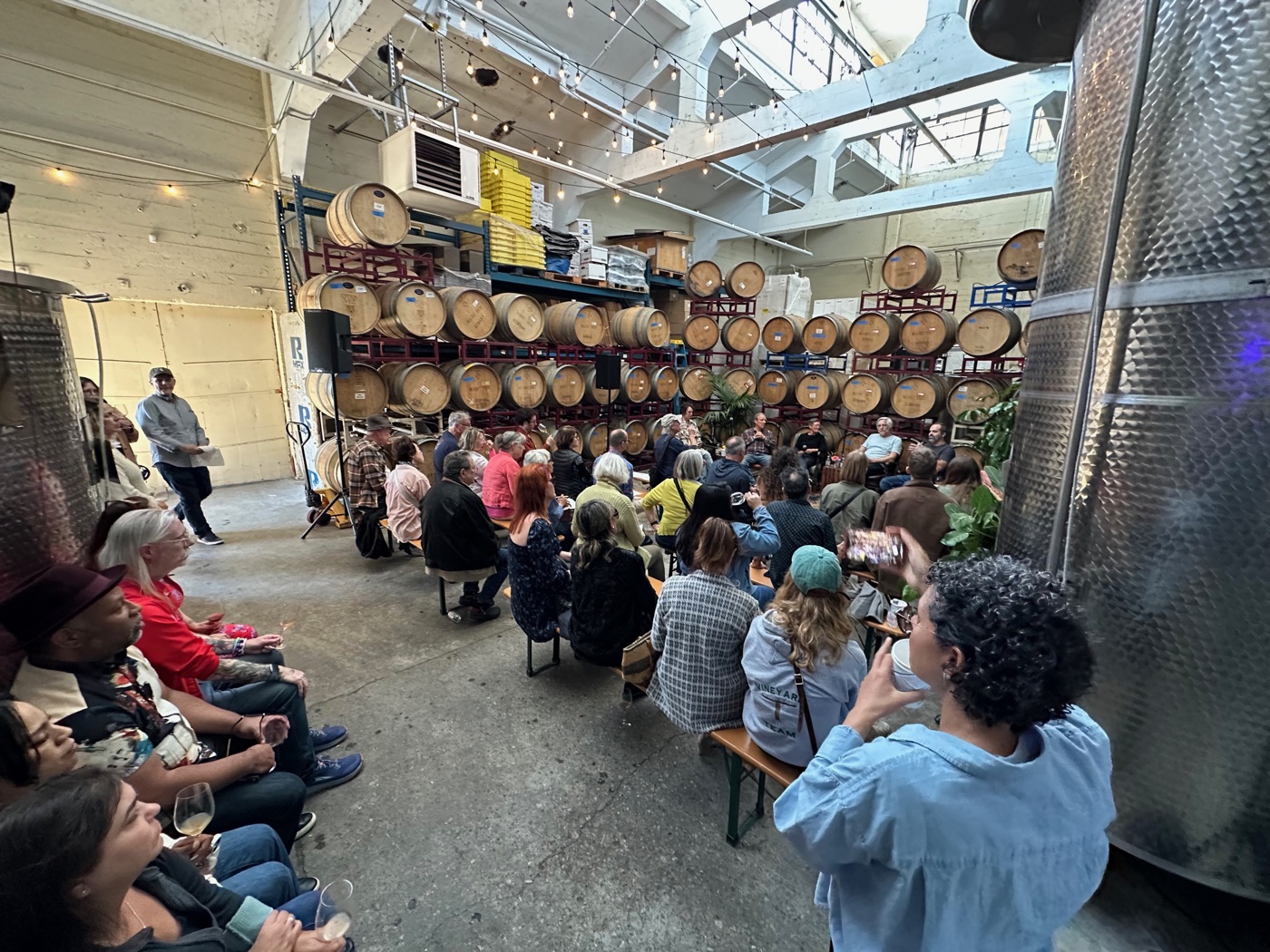 A full barrel room at a member event